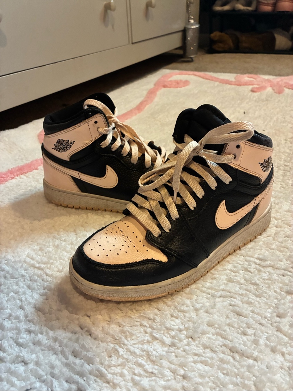 Jordan 1 Mid Women's Black and Light Pink Sneakers